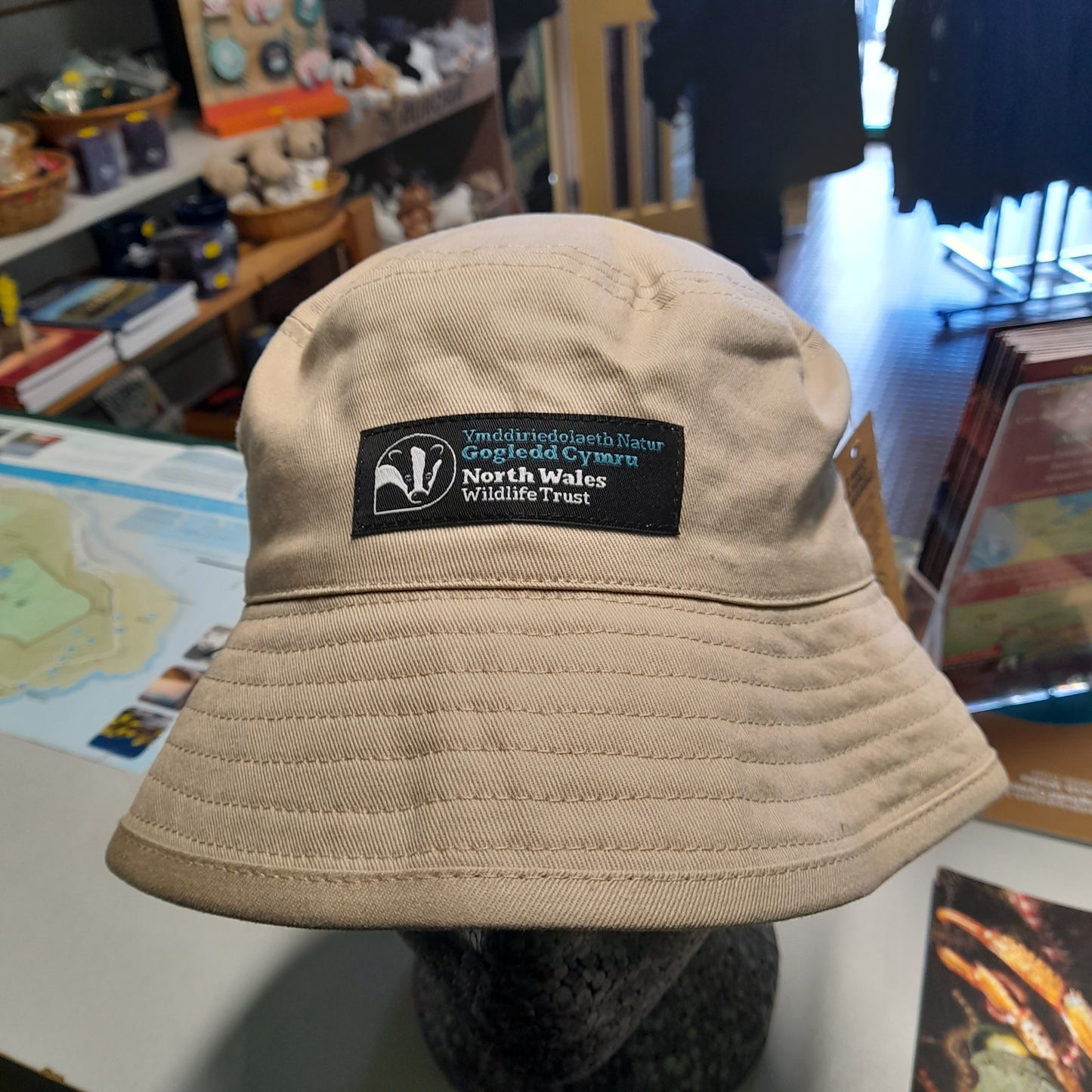Organic cotton sun hat with NWWT badge logo