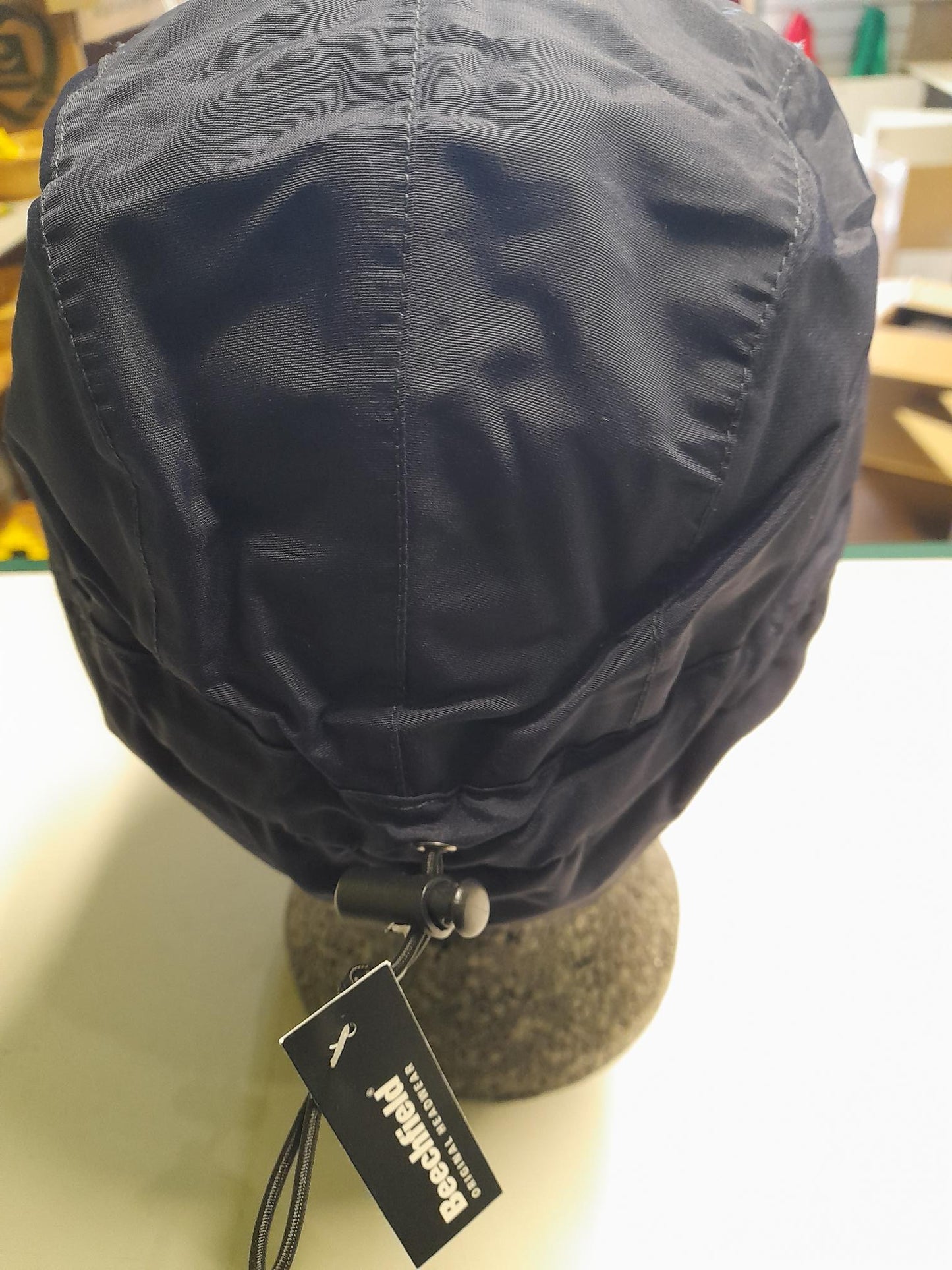 NWWT fleece lined mountain cap, with earflaps